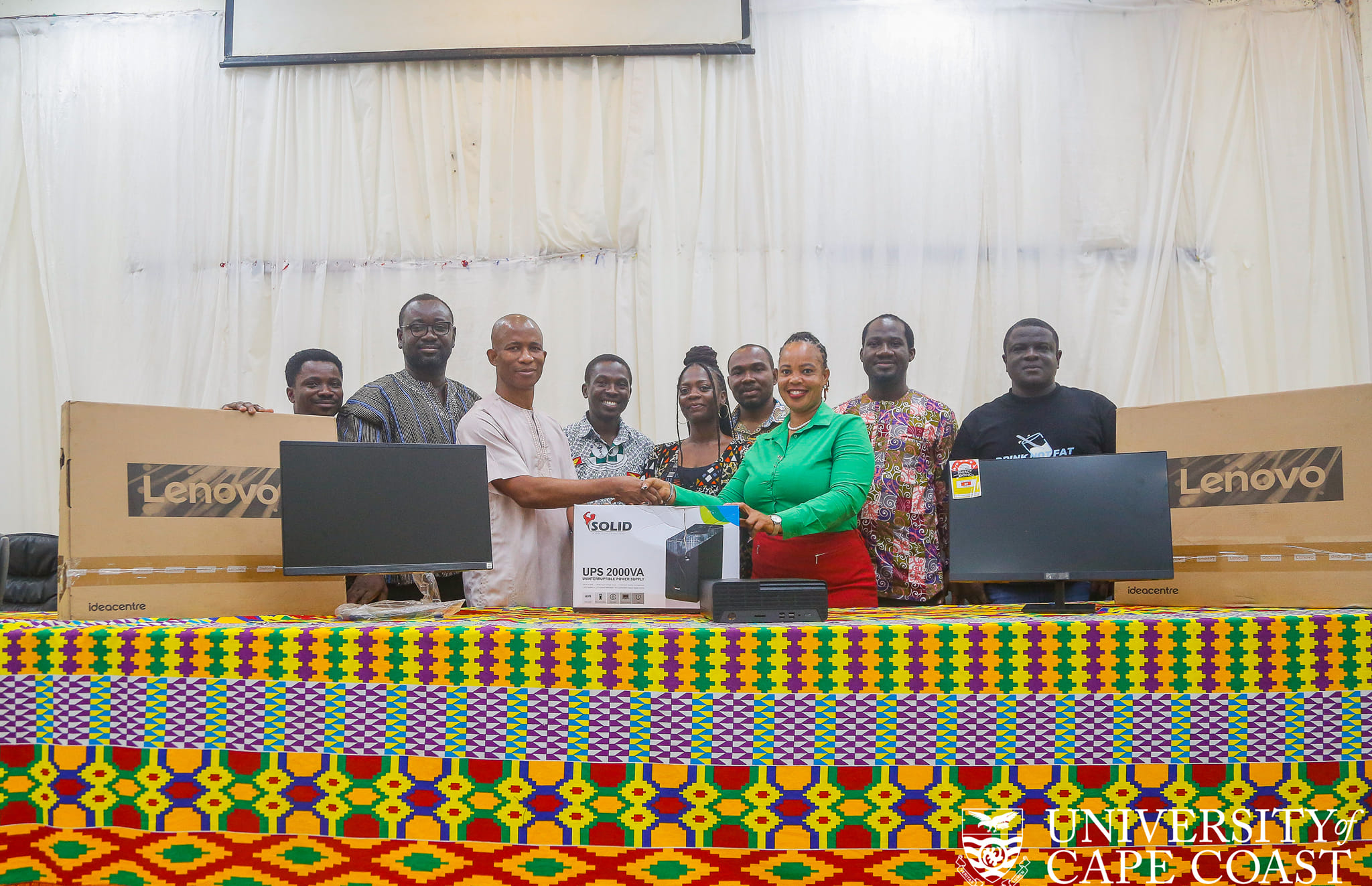 Professor Elvis Ofori-Ameyaw receiving a computer donation