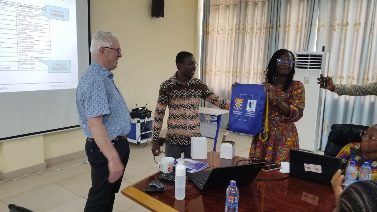 Jos Kessels receiving a gift of appreciation from the Prof. Elvis Ofori Ameyaw and the Mrs Esther Nimo