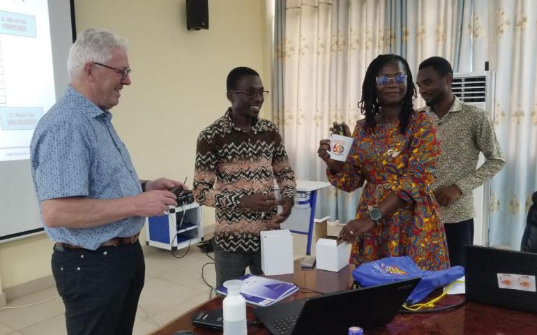 Jos Kessels receiving a gift of appreciation from the Prof. Elvis Ofori Ameyaw and the Mrs Esther Nimo